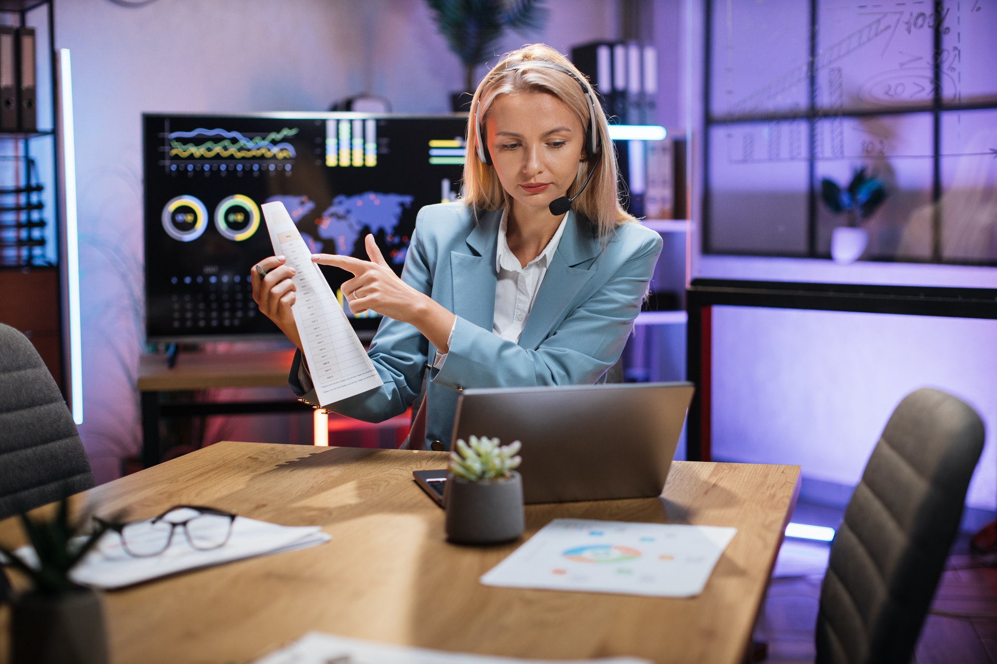 business-woman-using-headset-and-laptop-for-video-call.jpg