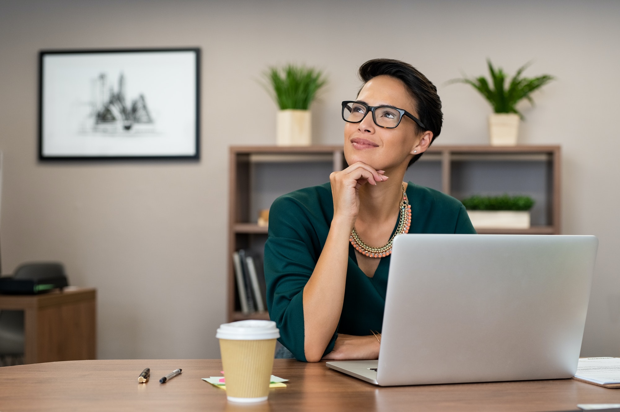 young-fashionable-business-woman-thinking.jpg