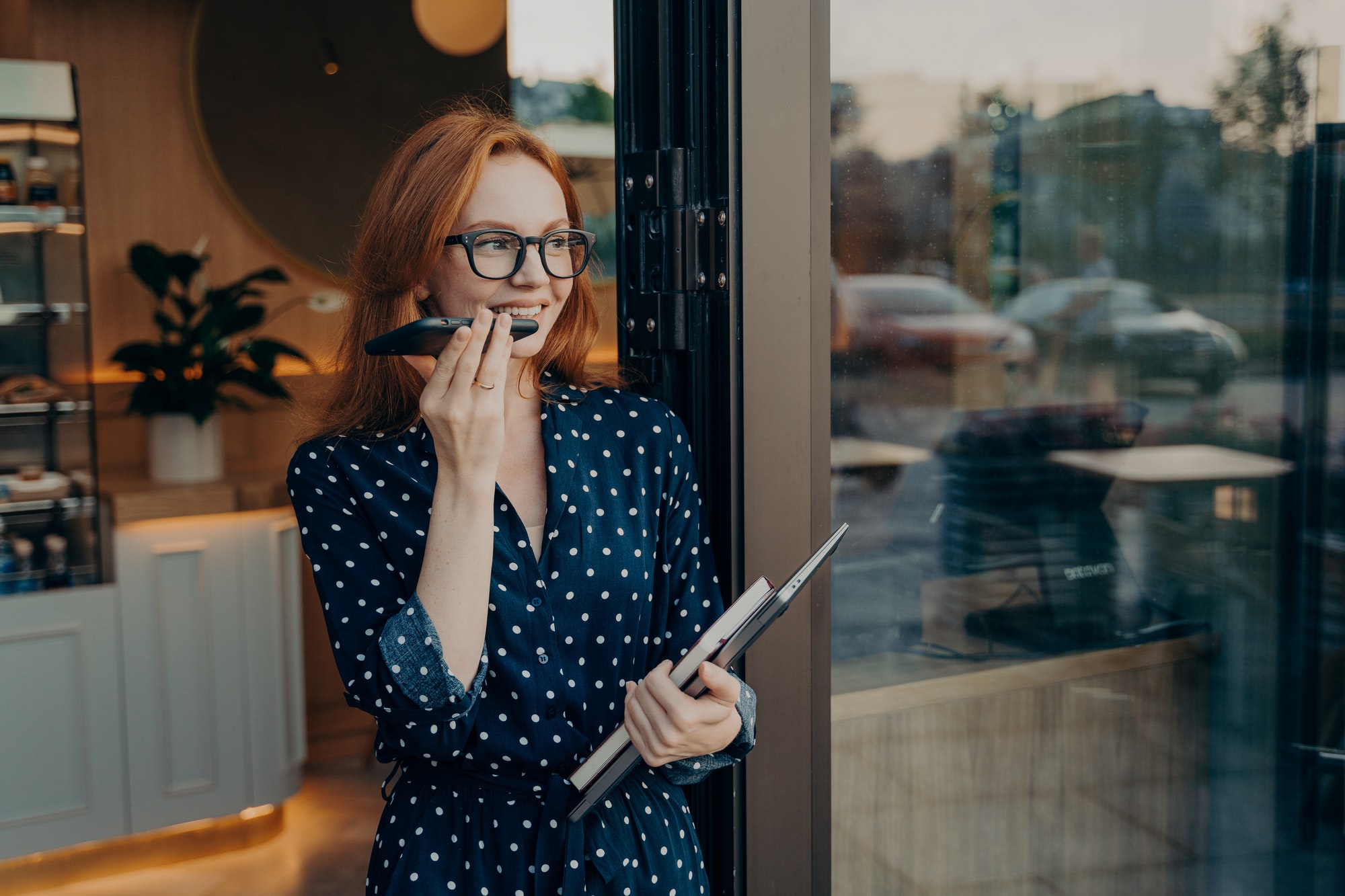 young-woman-makes-voice-call-uses-modern-technologies-for-communication.jpg